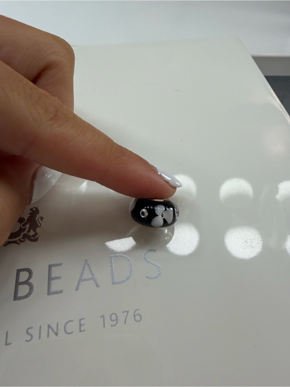 Trollbeads Black Murano Glass Bead with White Flower Accent